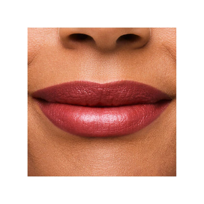 Close-up of a person's lips wearing a pink lipstick on a white background