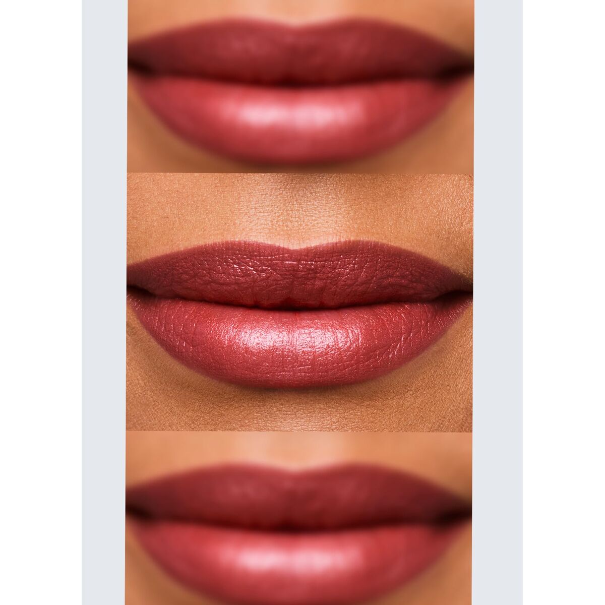Close-up of three different shades of red lipstick on a neutral background