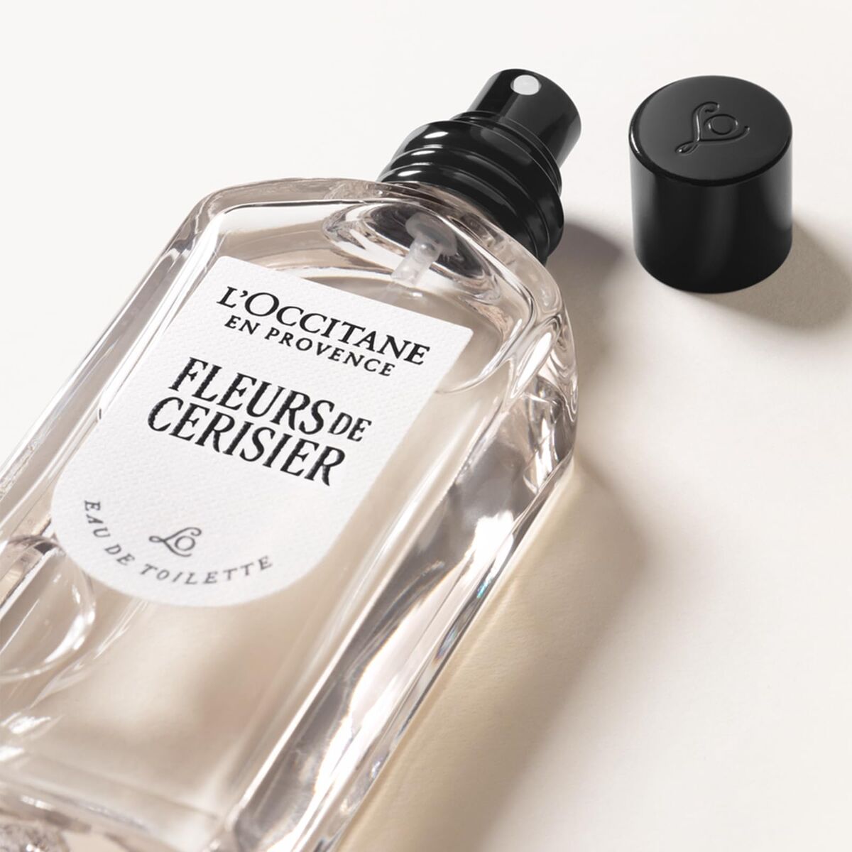 L'Occitane En Provence Fleurs de Cerisier perfume bottle on a white background