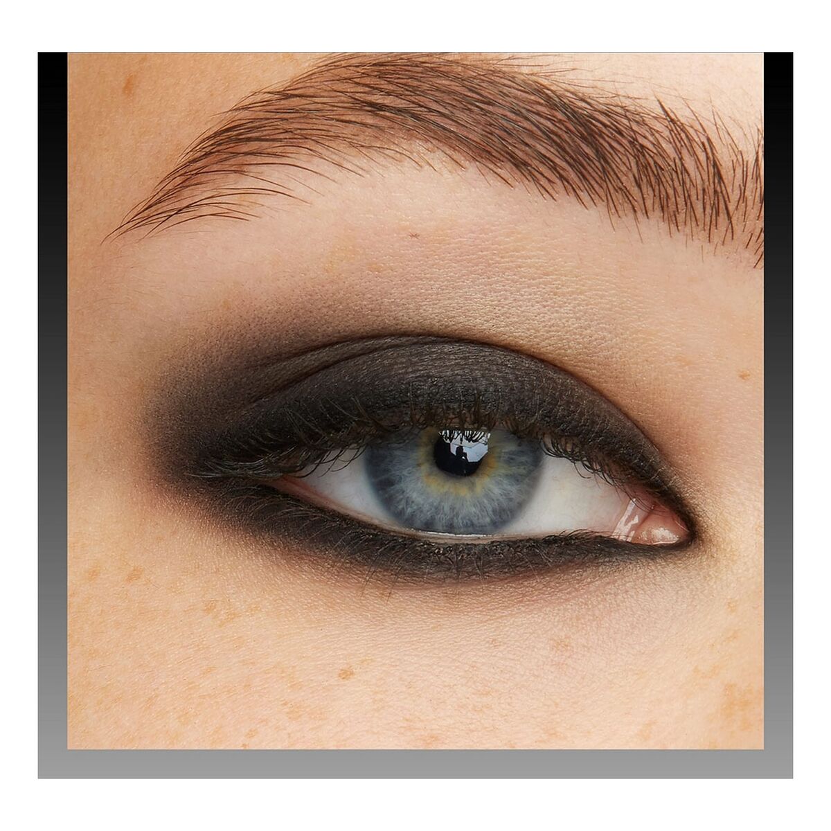 Close-up of a person's eye with smoky eye makeup