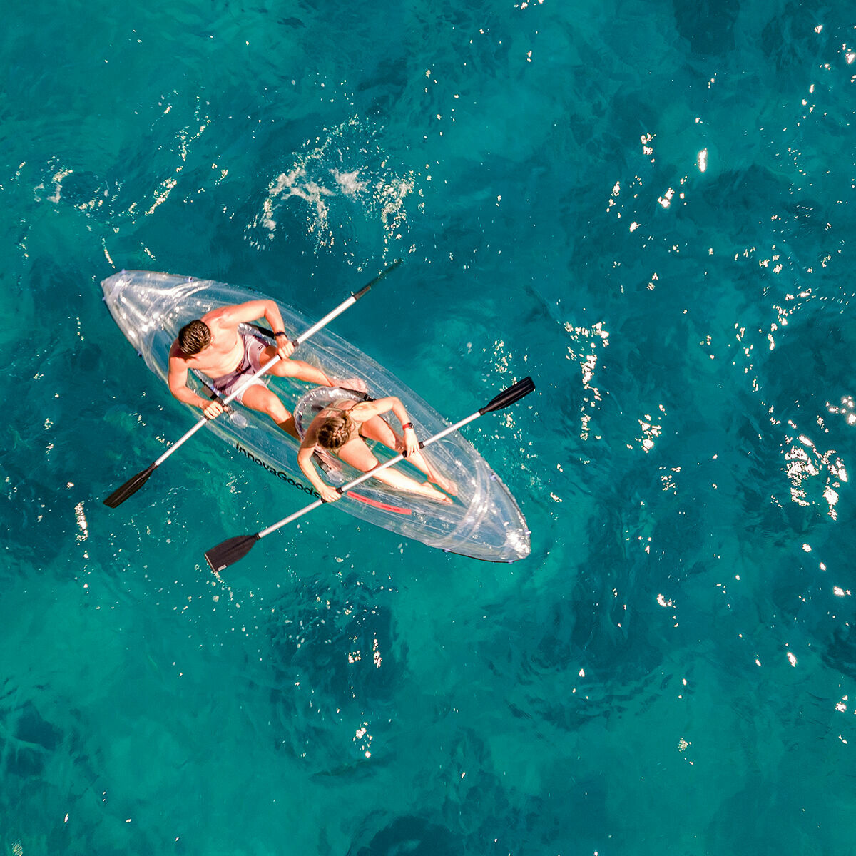 Inflatable kayak with view through transparent hull