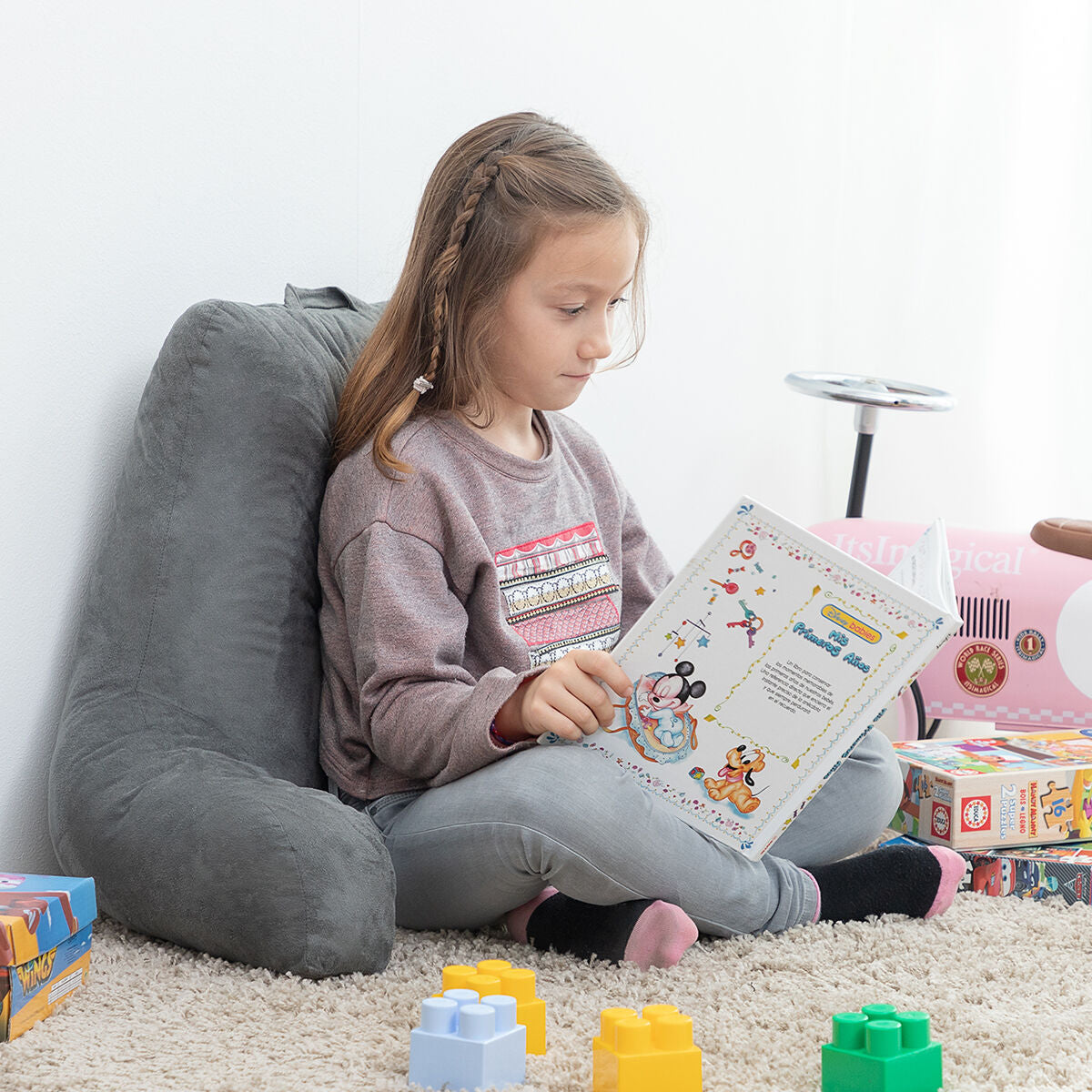 Multi‑purpose floor pillow for reading and relaxing