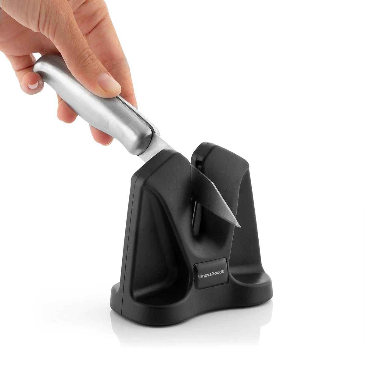 Knife sharpener with a hand holding a knife on a white background